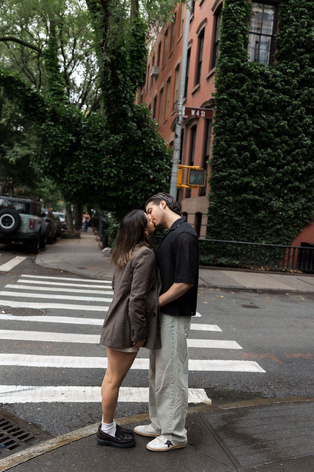 Couple kissing in the streets of the West Village NYC