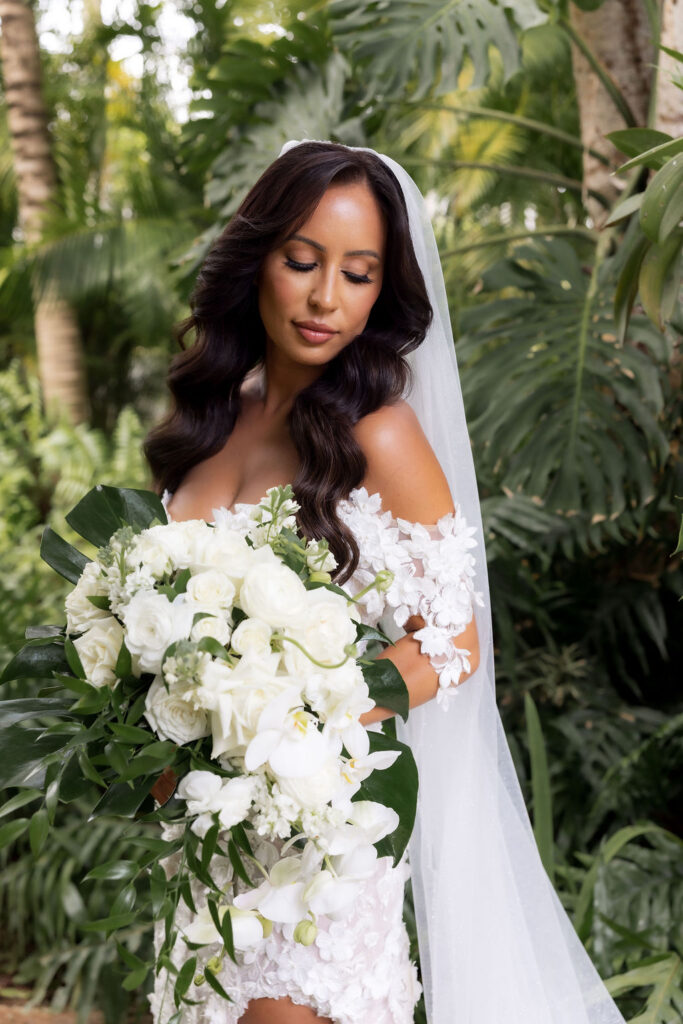 Romantic portraits from a Casa De Campo wedding in the Dominican Republic surrounded by lush tropical scenery.