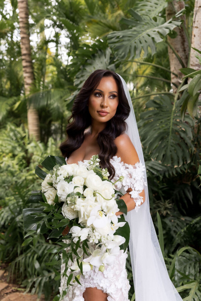 Romantic portraits from a Casa De Campo wedding in the Dominican Republic surrounded by lush tropical scenery.