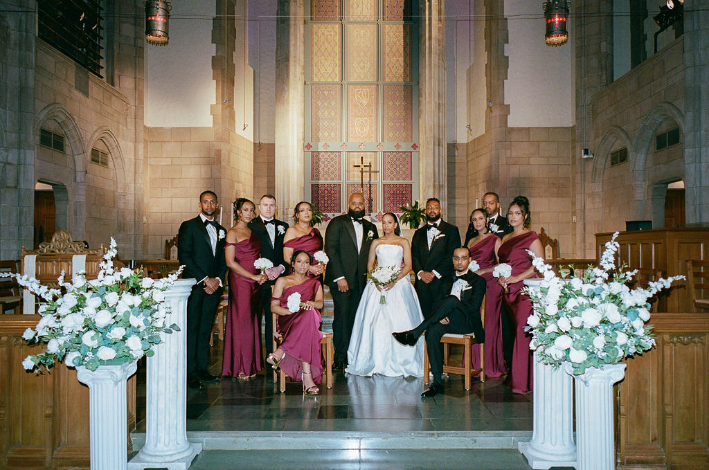Guests celebrating with the newlyweds during a traditional Ethiopian wedding reception.
